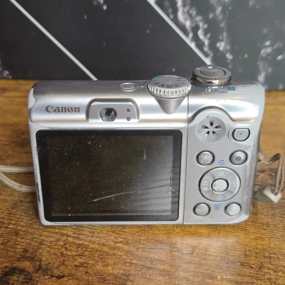 Canon PowerShot A1100 IS 12.1MP CCD Digital Camera Silver Tested Working